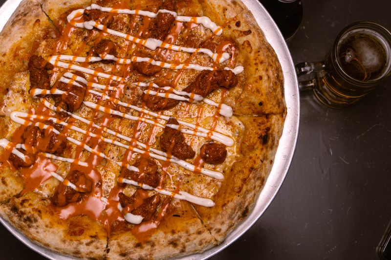 BBQ Chicken round table pizza with smoky barbecue sauce