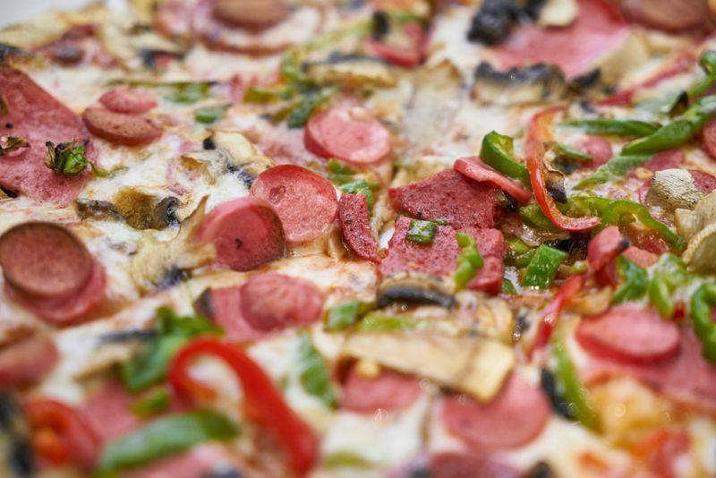 Truffle mushroom gourmet pizza with premium truffle oil