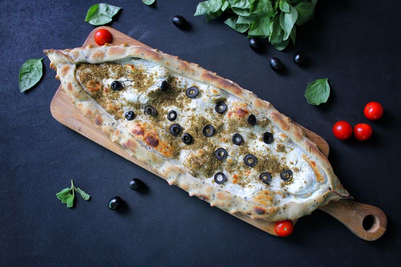 Garden harvest vegetarian pizza with fresh seasonal vegetables